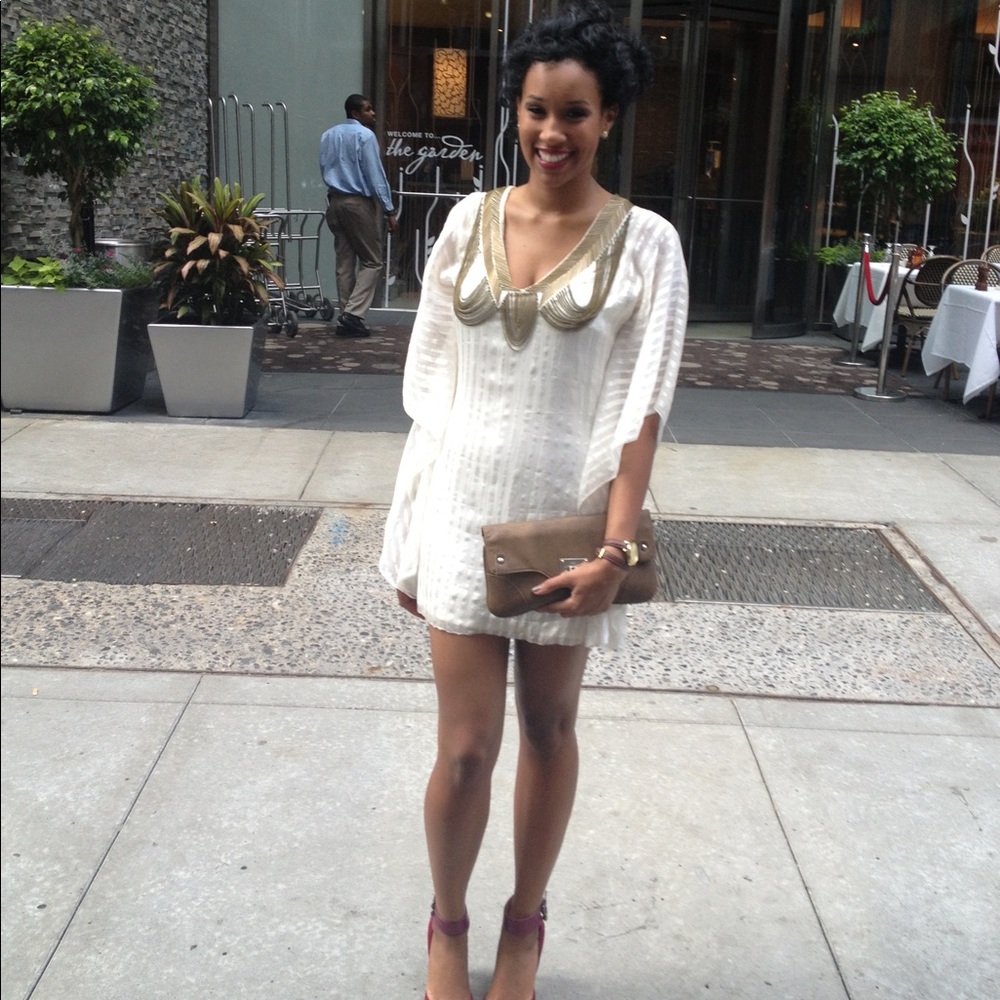Cream Sheri Bodell dress with gold accents